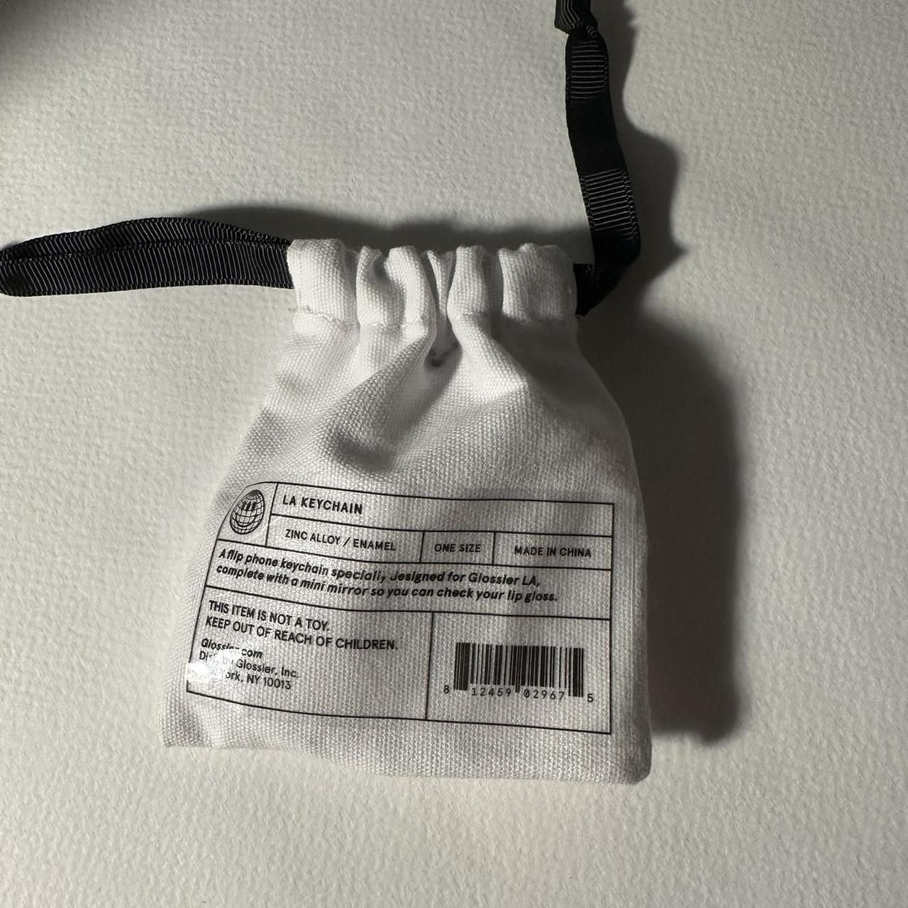 Glossier LA Keychain Brand new, in original... Depop