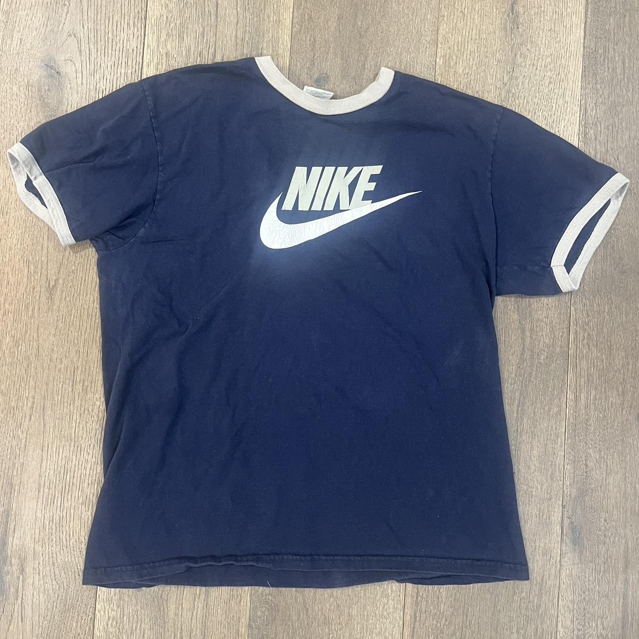 Vintage basic navy Nike shirt with the classic Nike... - Depop