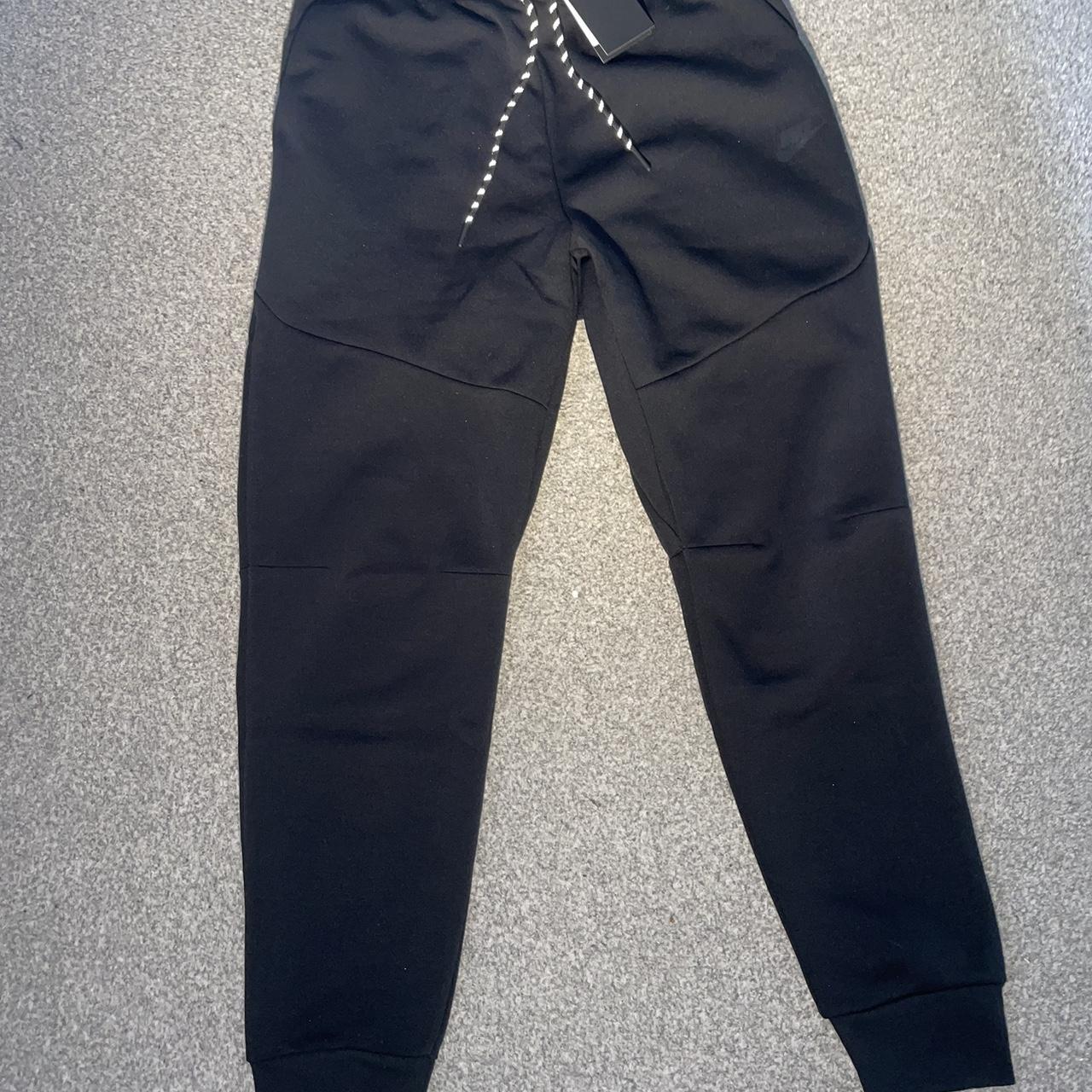 Black Nike Tech Pants Brand new SAYS SIZE M BUT WILL... - Depop