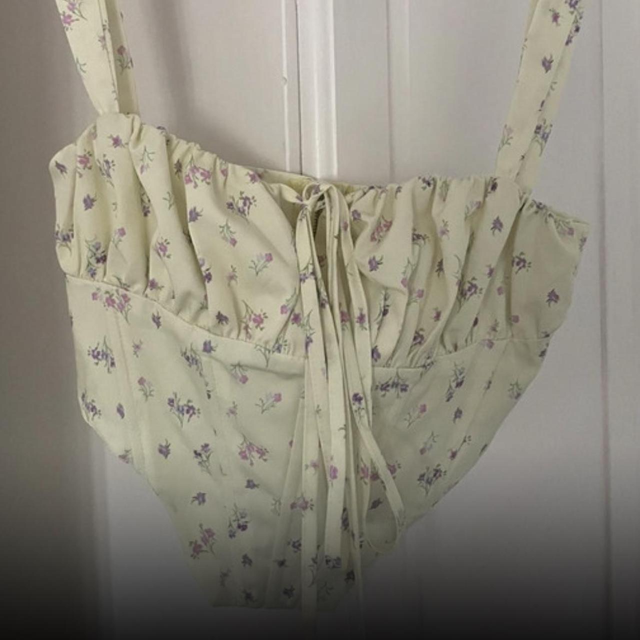 Yellow floral corset top. Size small. So pretty but... Depop