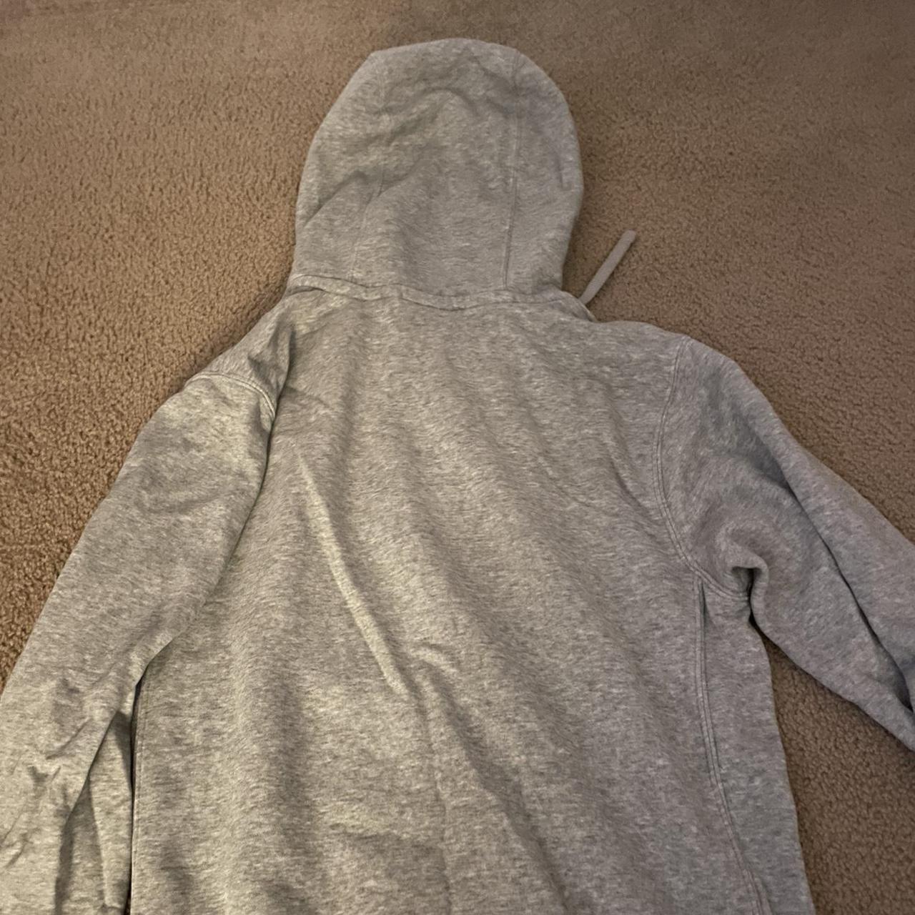Gray Nike hoodie - it has definitely been very well... - Depop