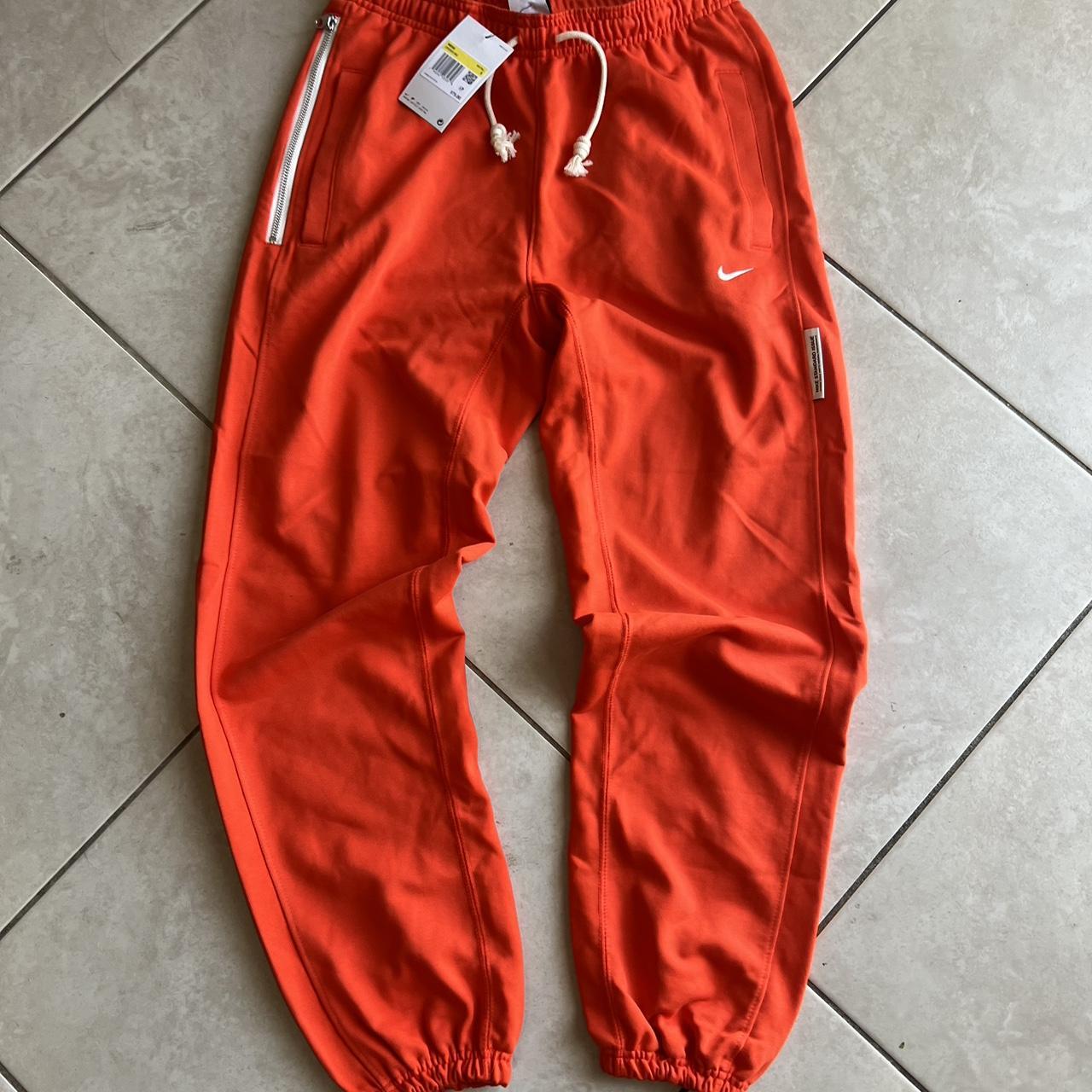 BRAND NEW Women s bright orange sweatpants goes