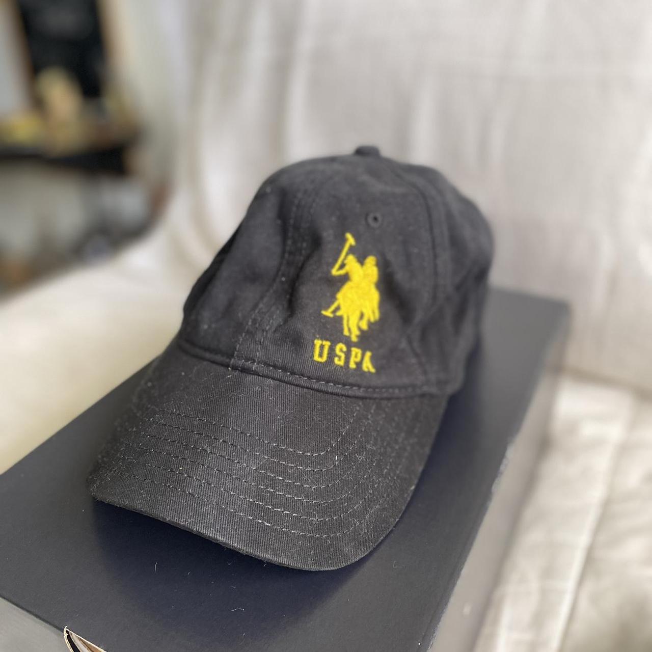 Black and sales yellow polo hat