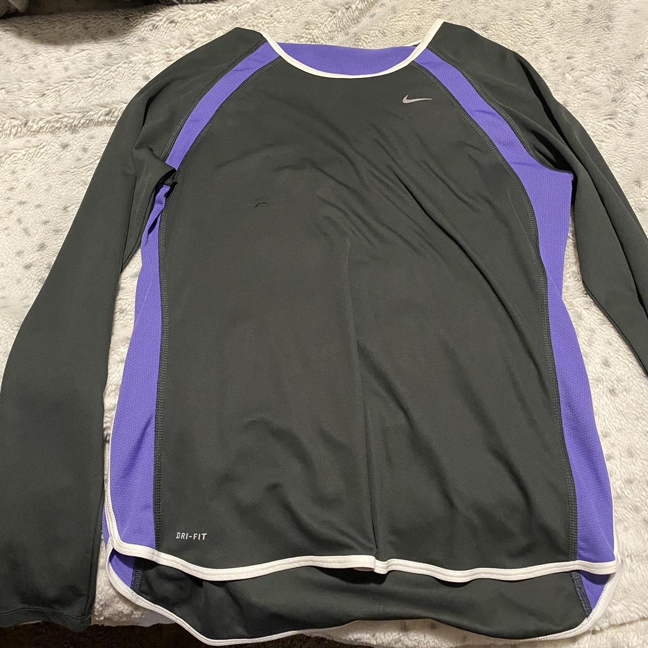 purple and gray nike shirt