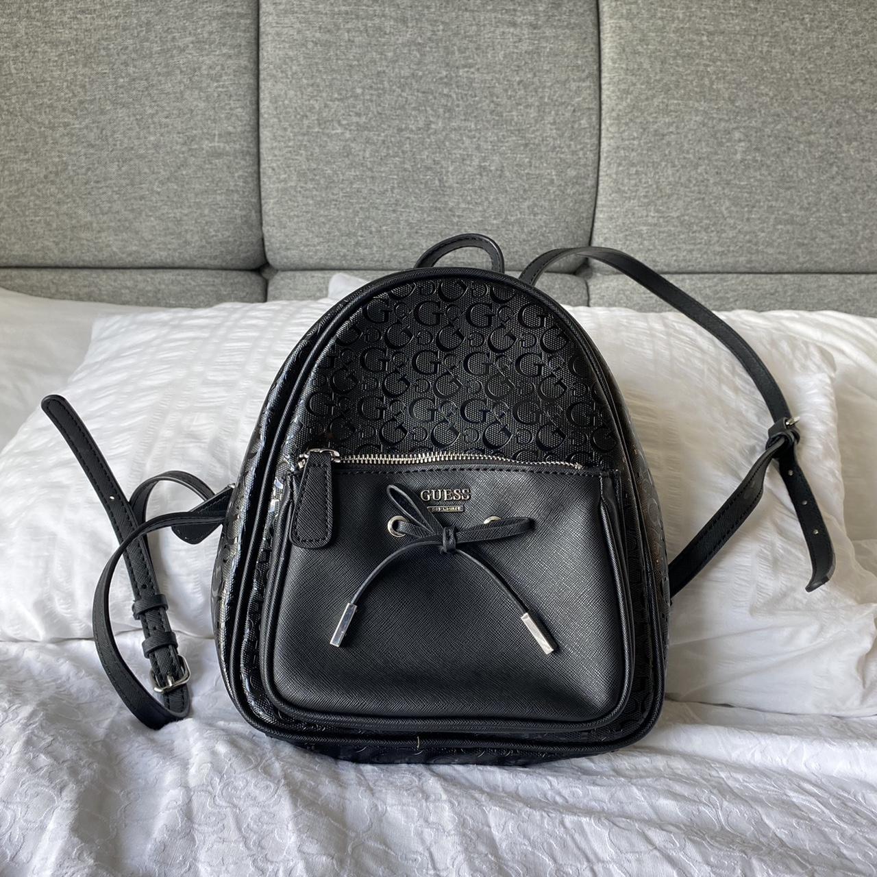 Guess mini backpack in monogram black, perfect for... Depop