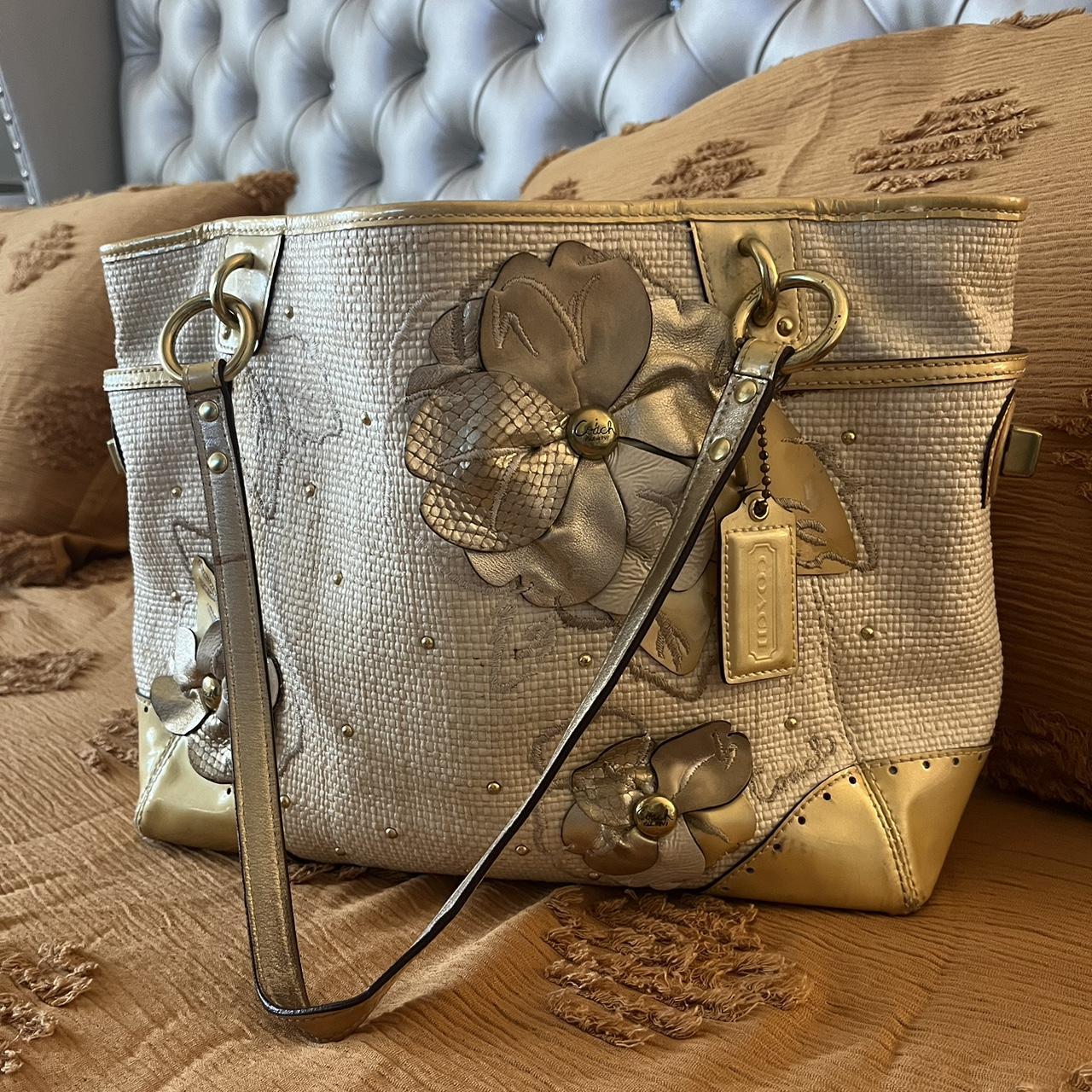 Coach tote purse with floral gold embellishments