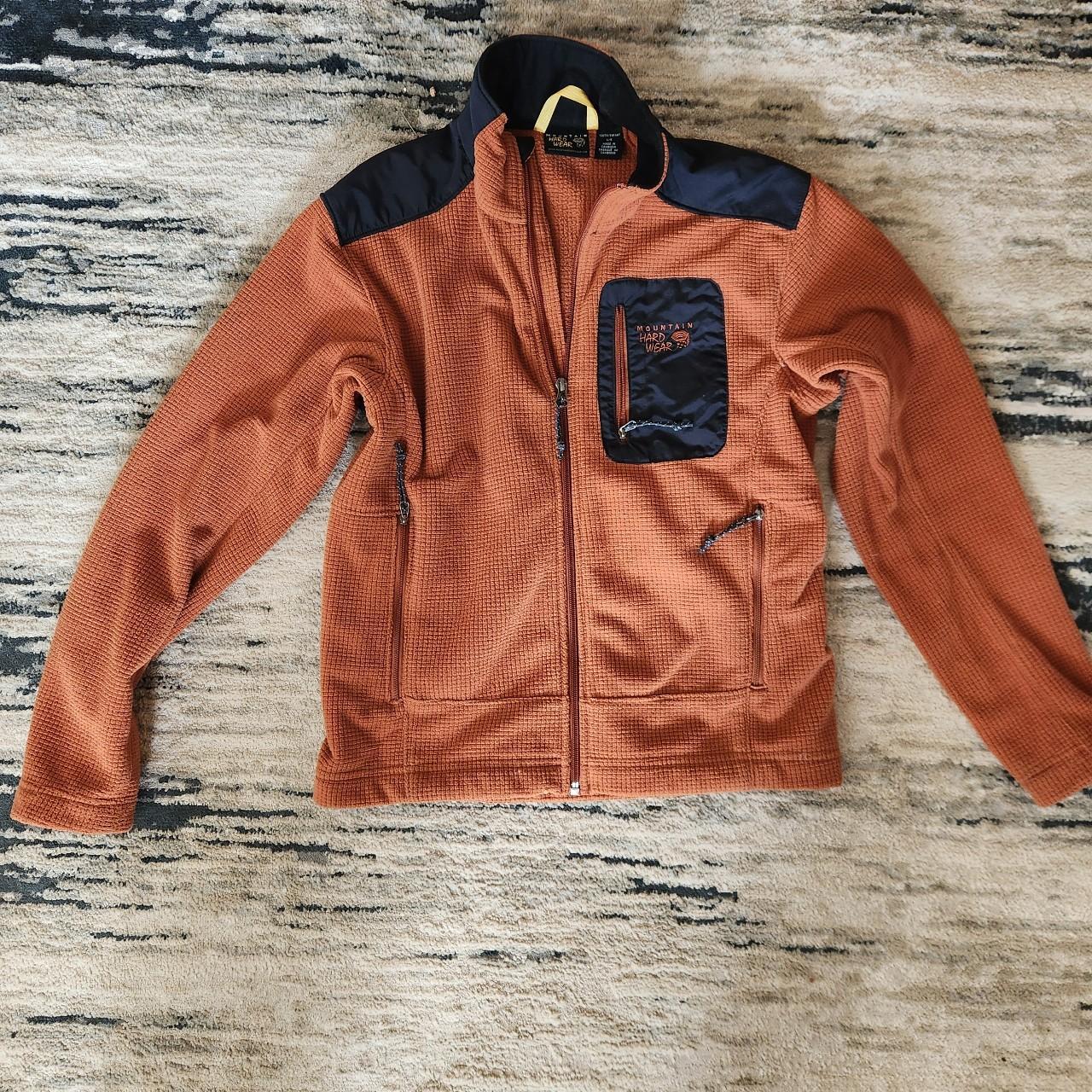 Mountain Hardware jacket. Orange with black... Depop