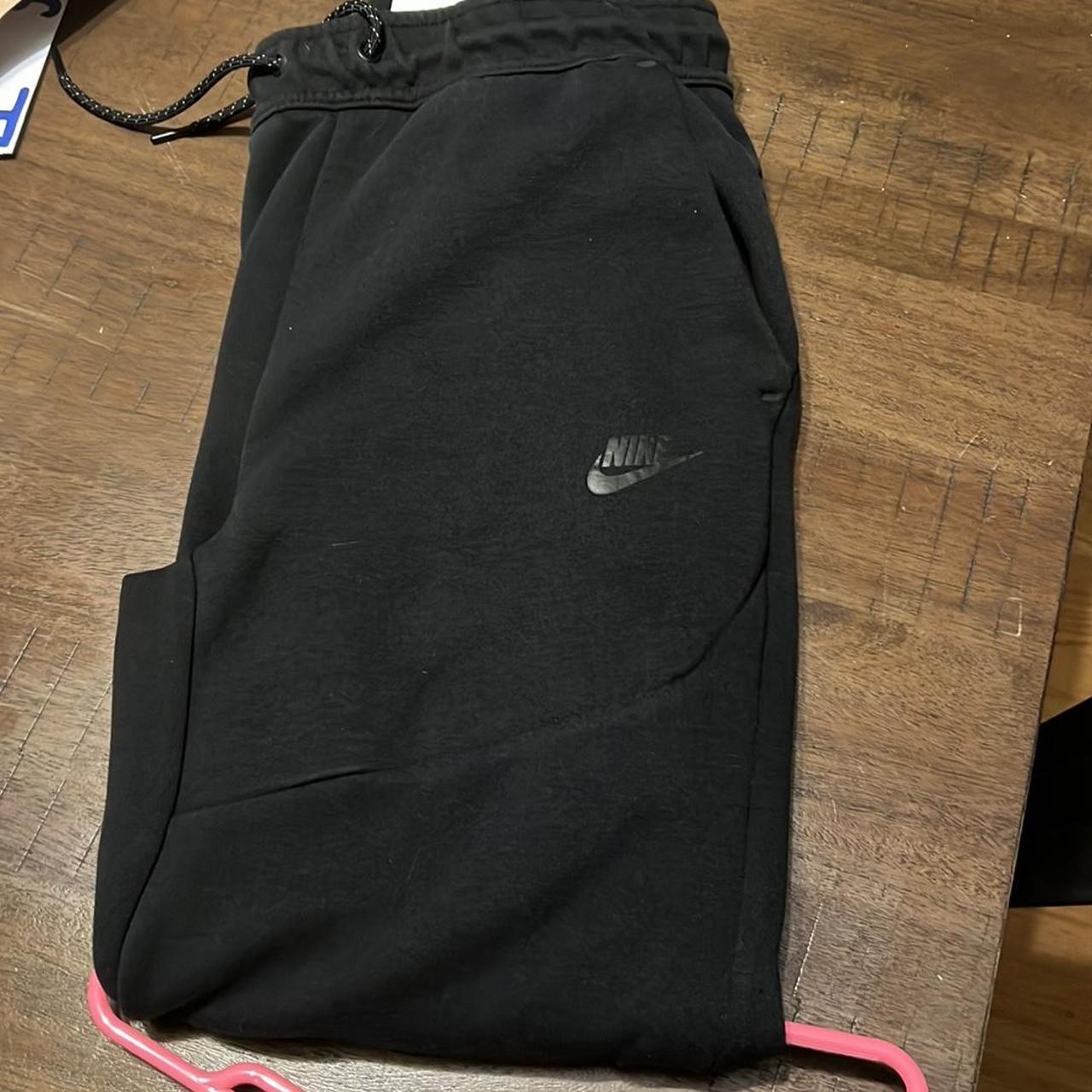 Black Nike tech pants size S - Depop