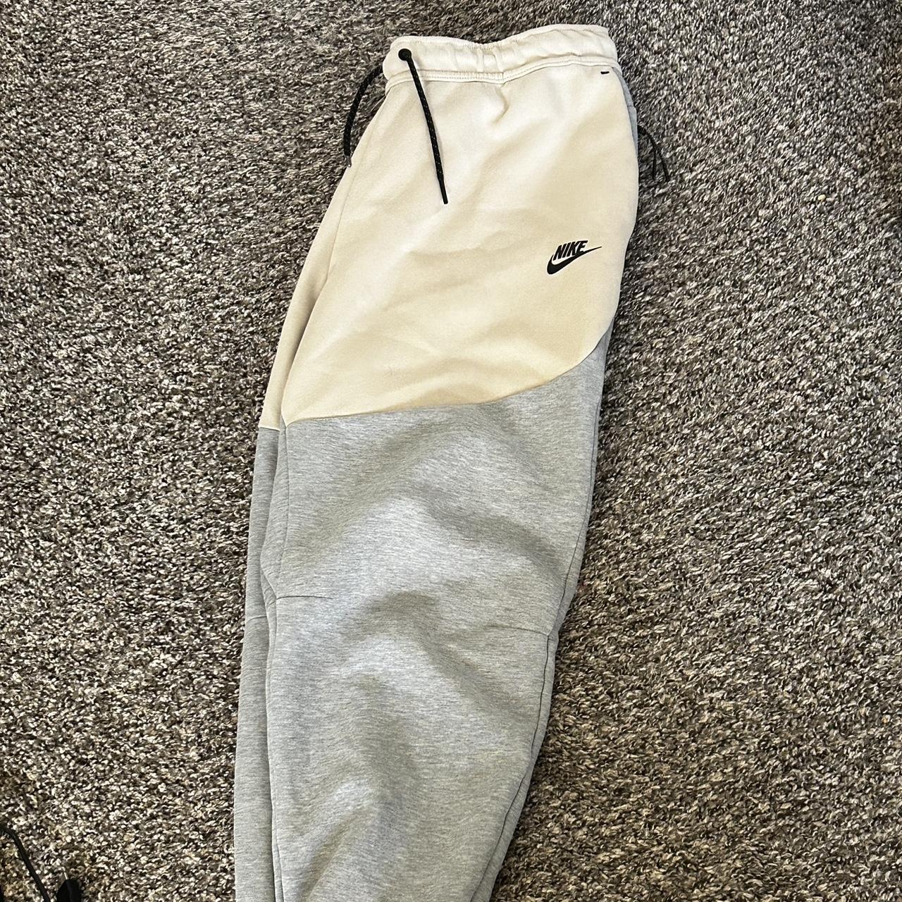 nike tech cream joggers