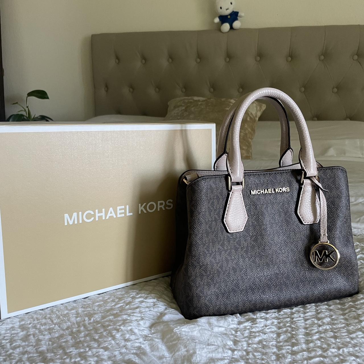 Brown monogram Michael Kors bag with rose handle and. Depop