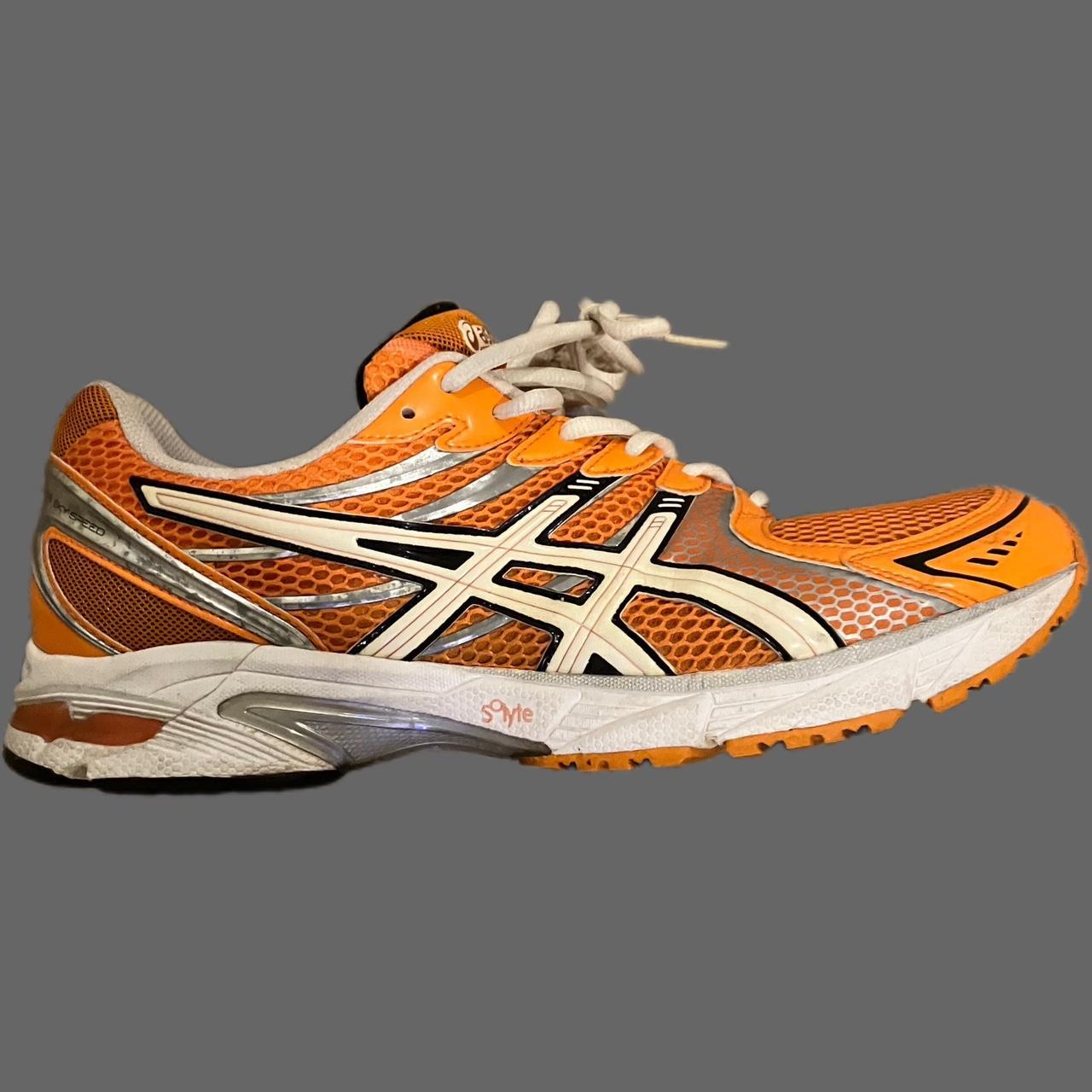 white and orange asics
