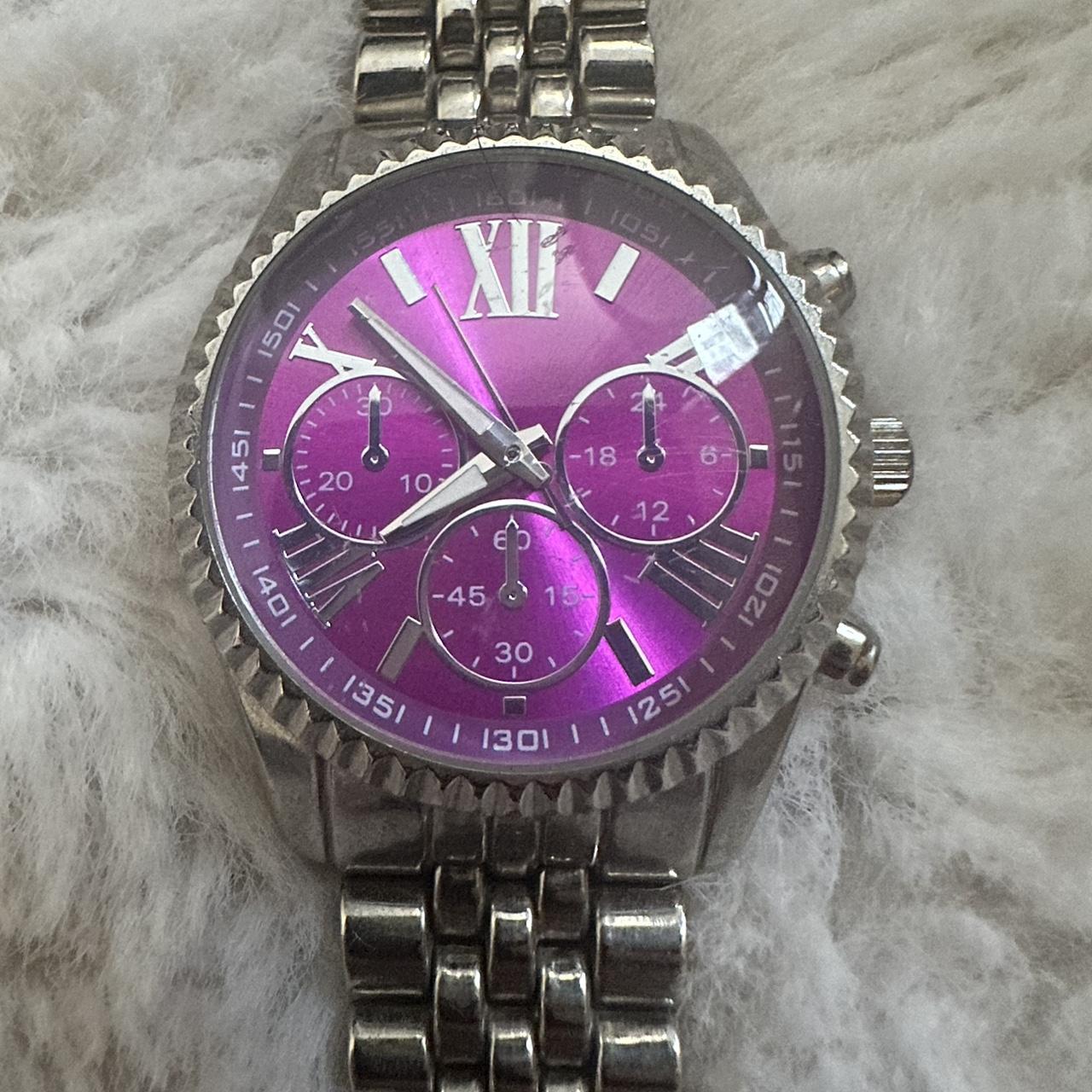 Silver watch with pink on sale face