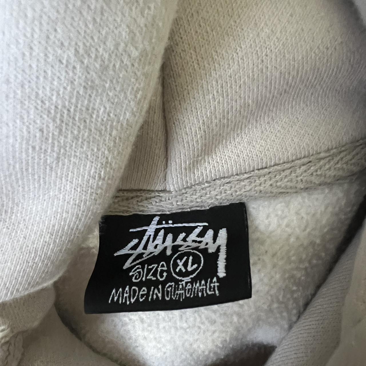 used smoke grey / cream stussy hoodie size... - Depop