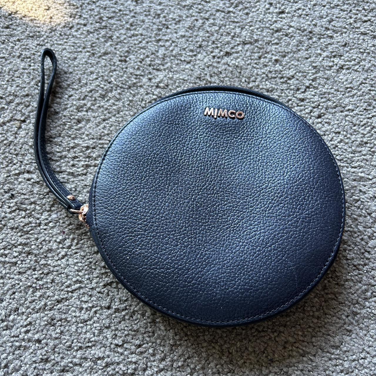 Brand is MIMCO Round medium sized pouch Photo with Depop