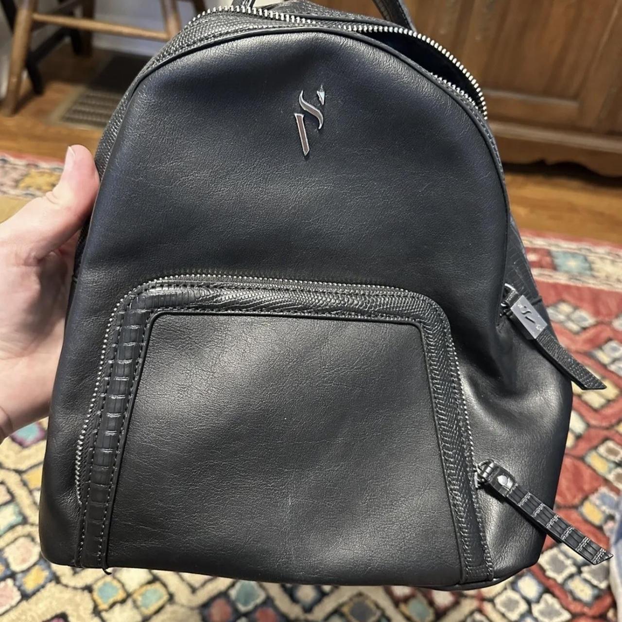 I am selling my Simply Vera Wang Backpack in black