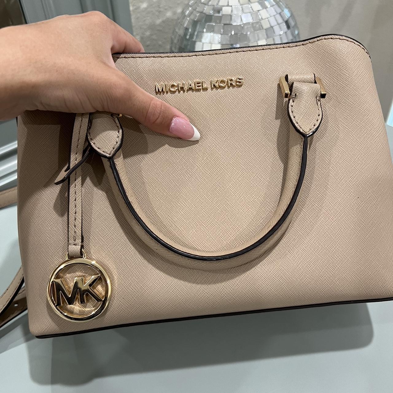 Cleaning a store michael kors purse