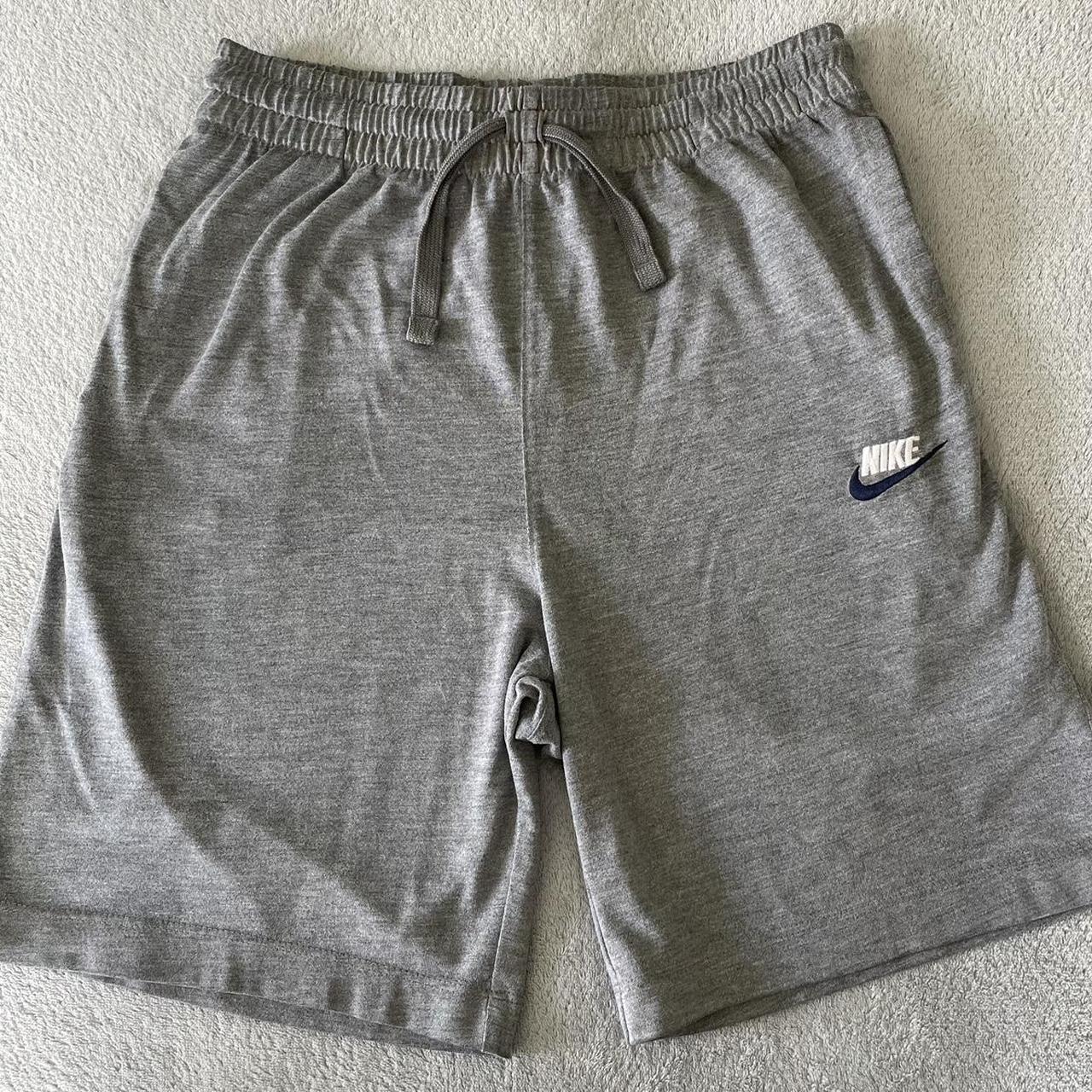 grey nike shorts junior