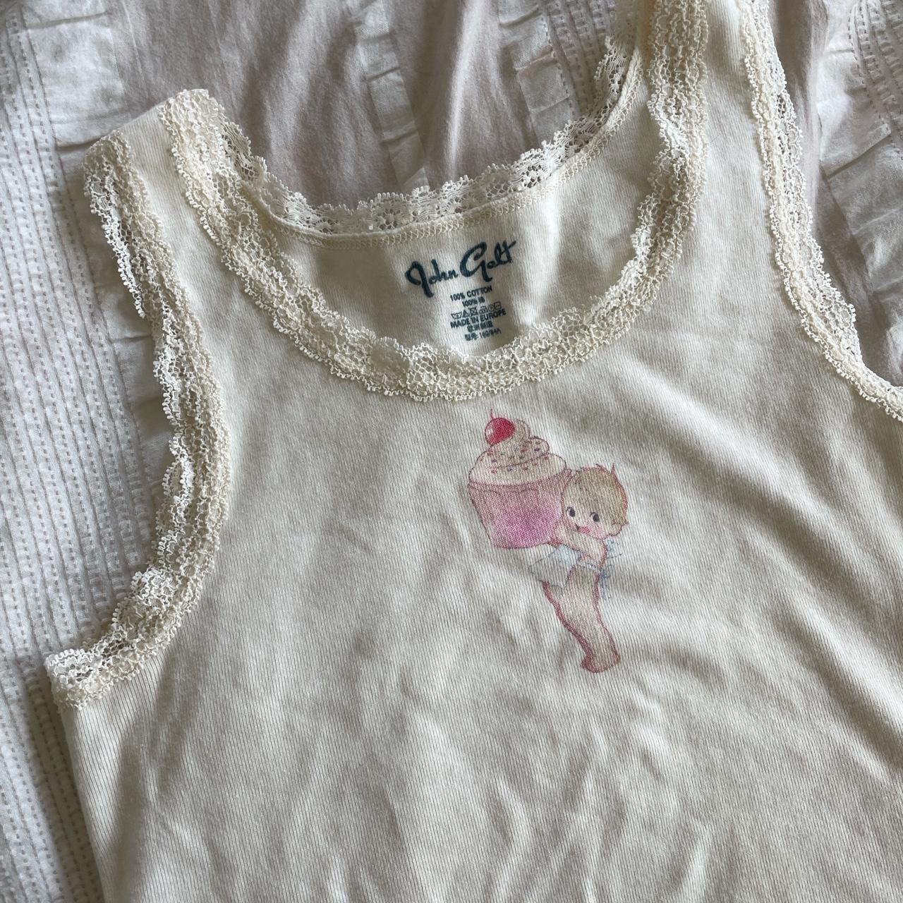 Brandy Melville lace cami baby holding cupcake print Depop
