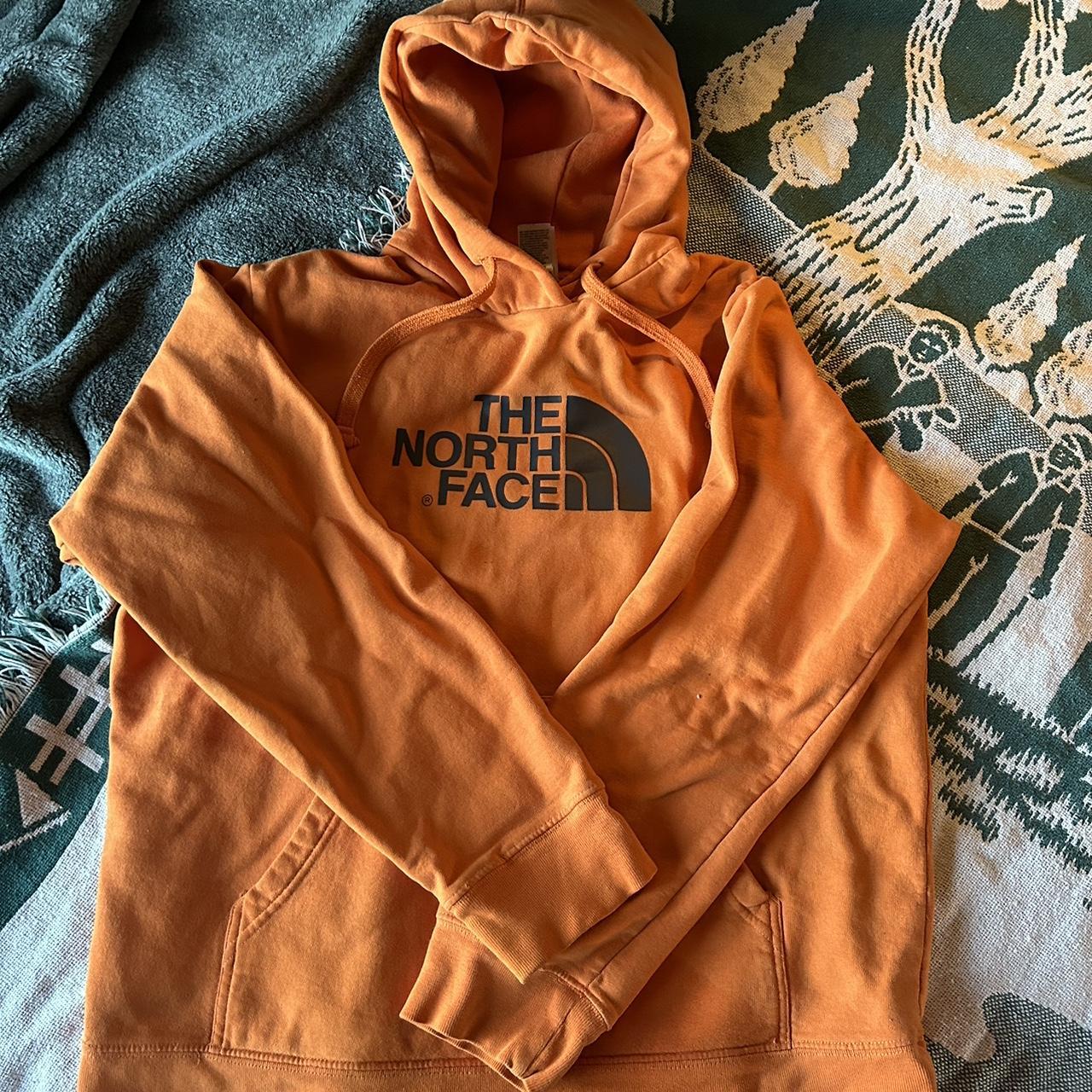 Orange north face sweatshirt deals