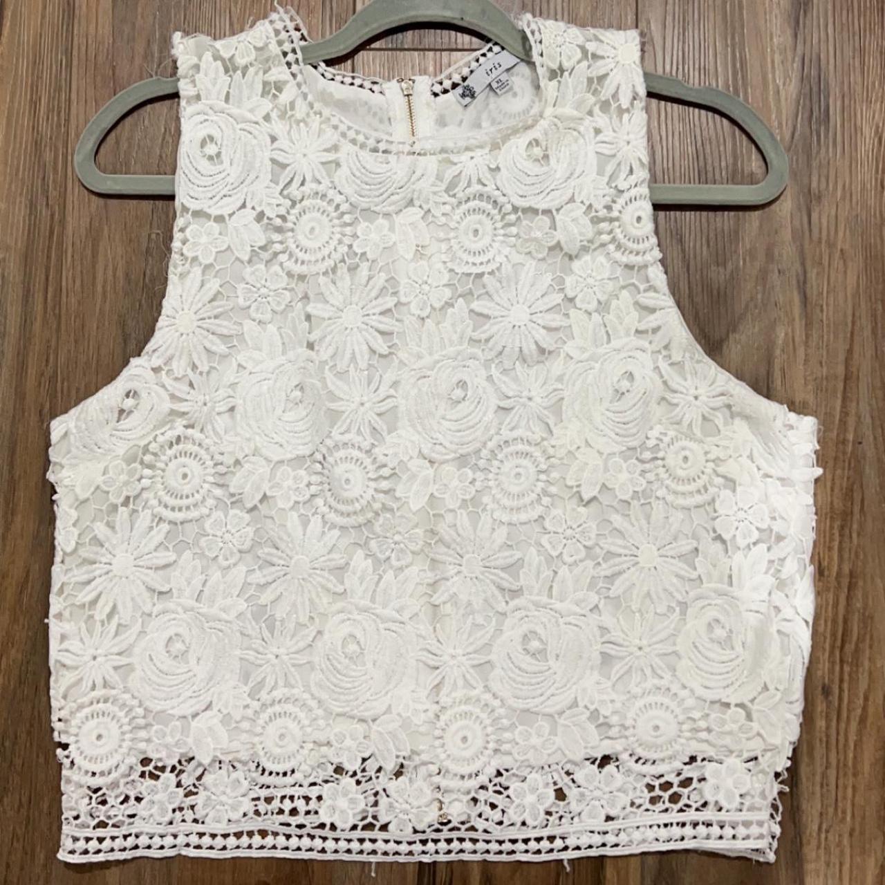 XL white flower sewn tank top -has a few tears and... - Depop