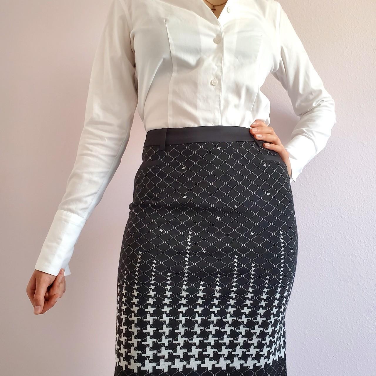 black skirt with white print with a slit in the. Depop