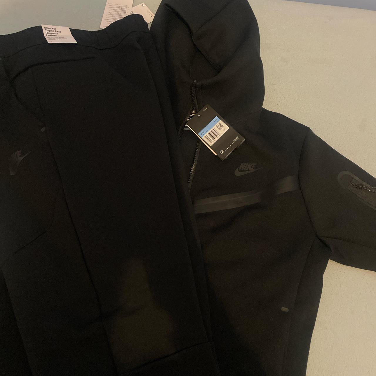 black nike tech jumper