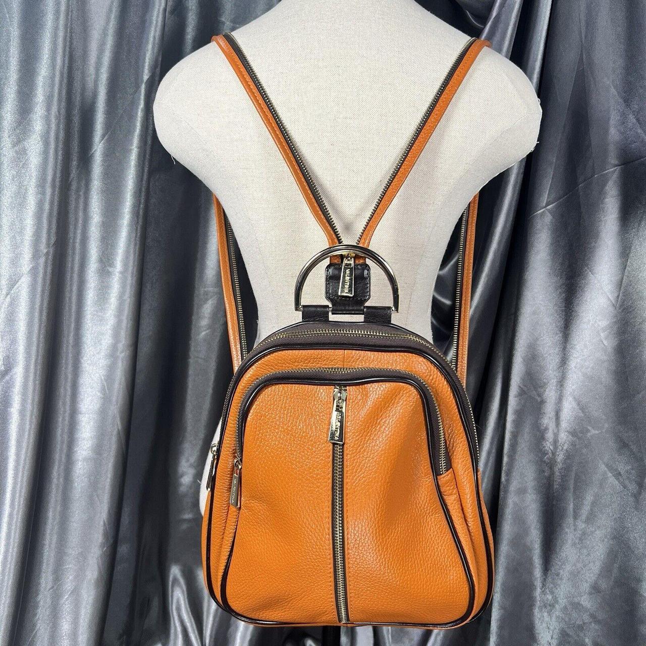 Valentina Pebbled high quality Leather Sling Backpack in like new condition.