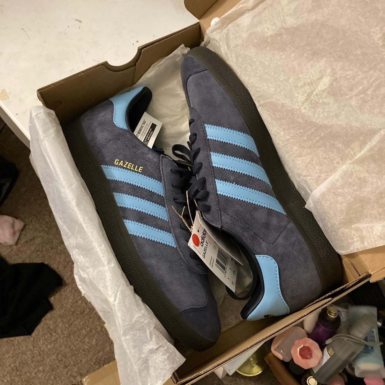 They are the adidas navy blue gazelles in a 10.5.... - Depop