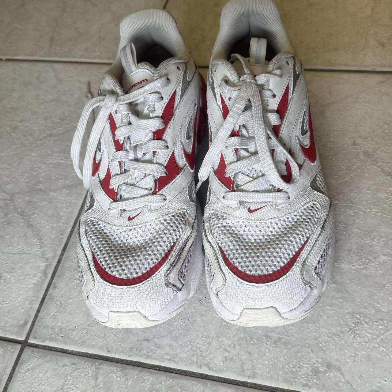 nike red and white tennis shoes