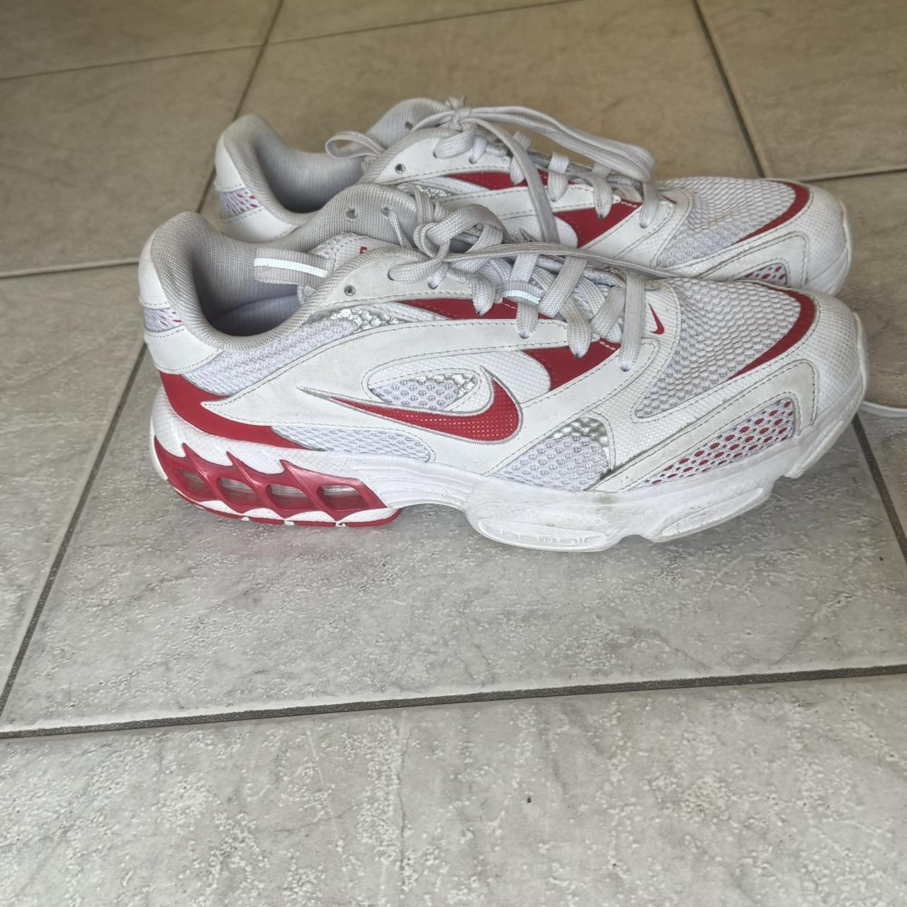nike red and white tennis shoes
