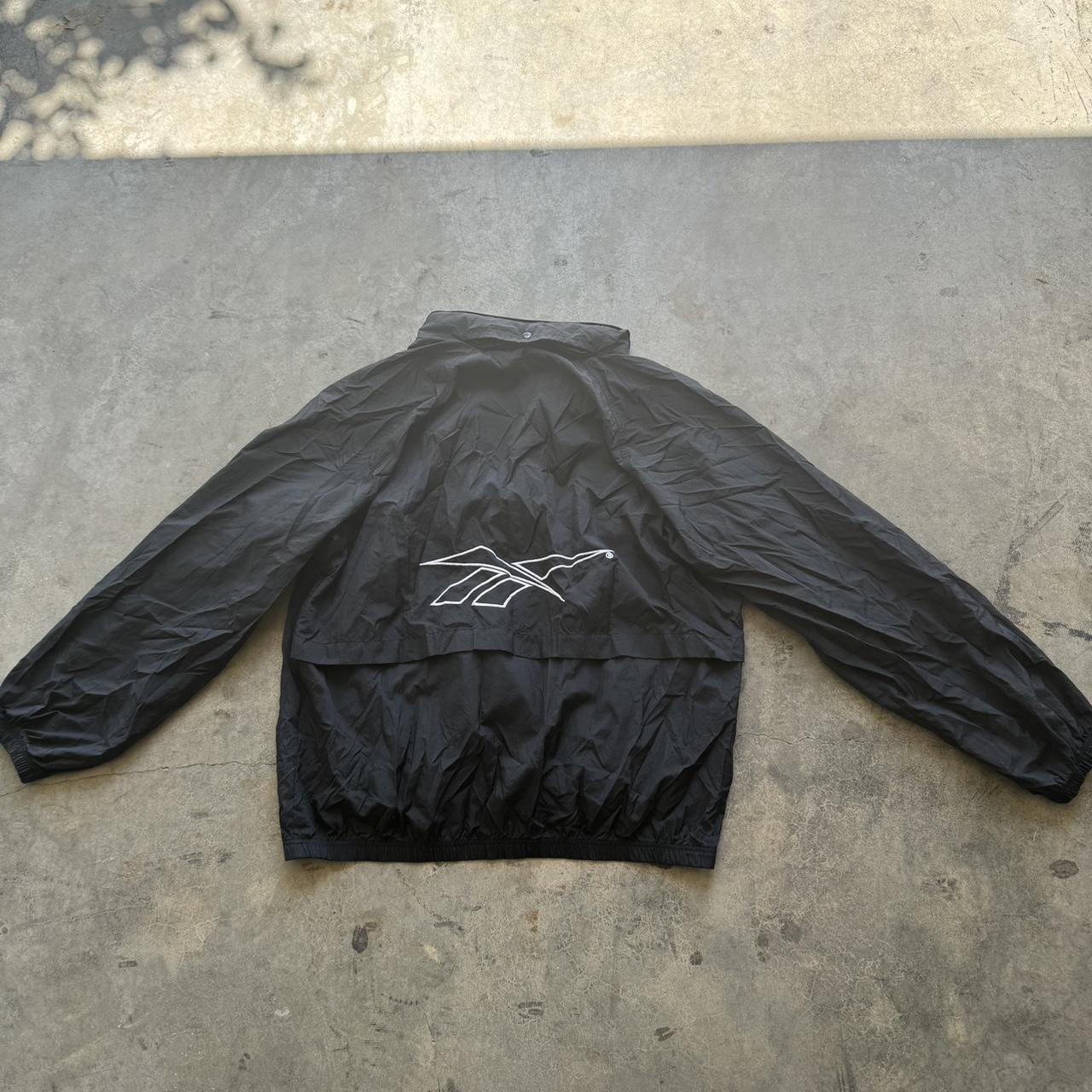 Vintage Reebok wind breaker Has a stow away... - Depop