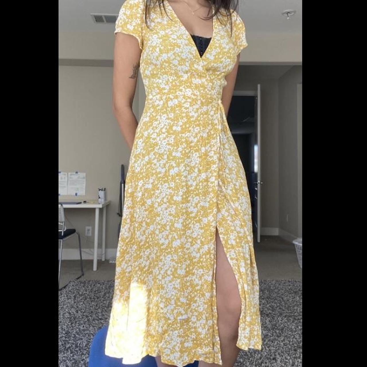 Yellow and white floral print wrap dress with a. Depop