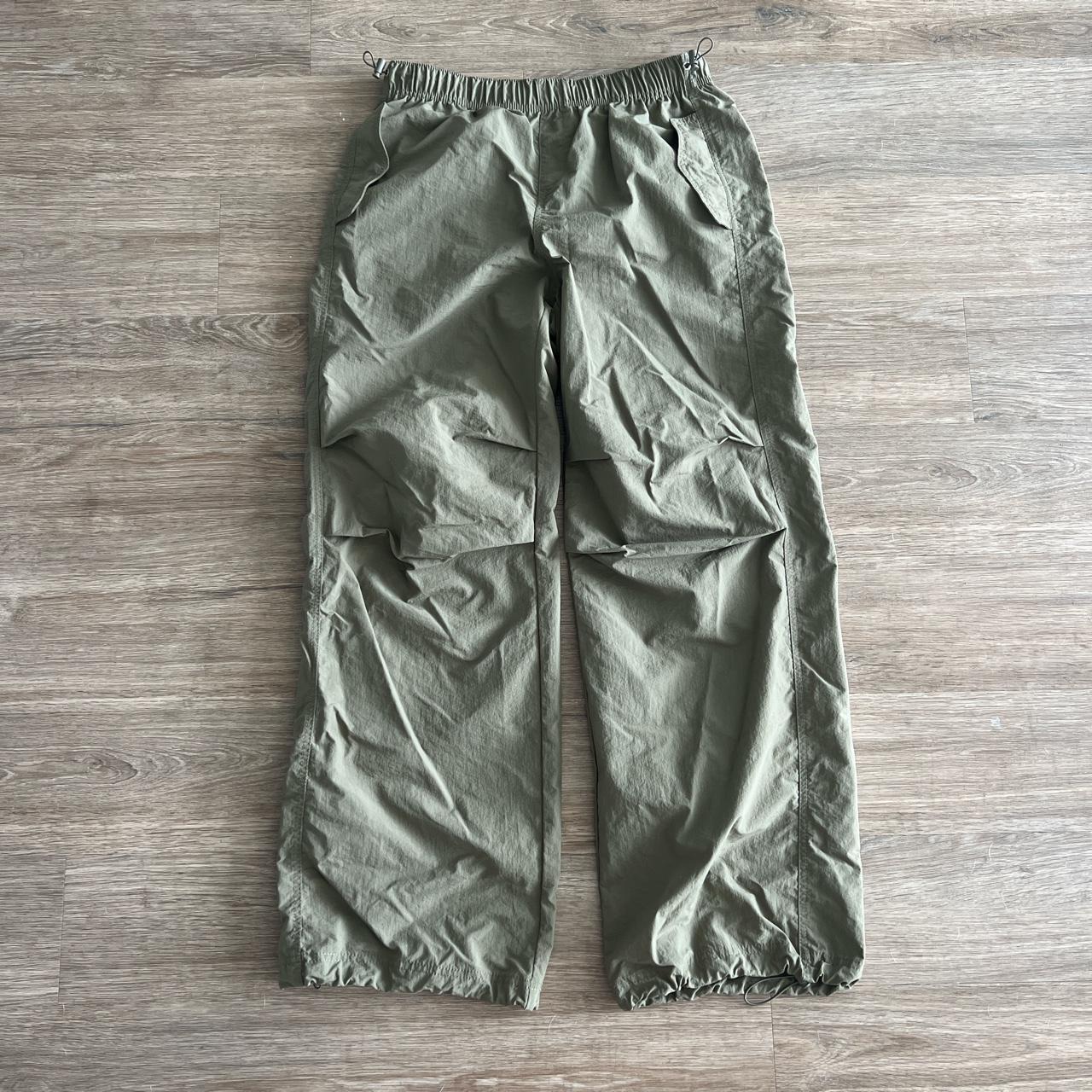 army green parachute pants - tagged size L (see... - Depop