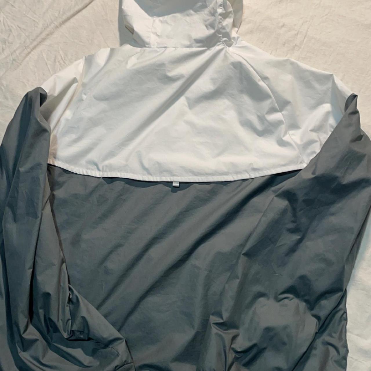 black grey and white nike windbreaker