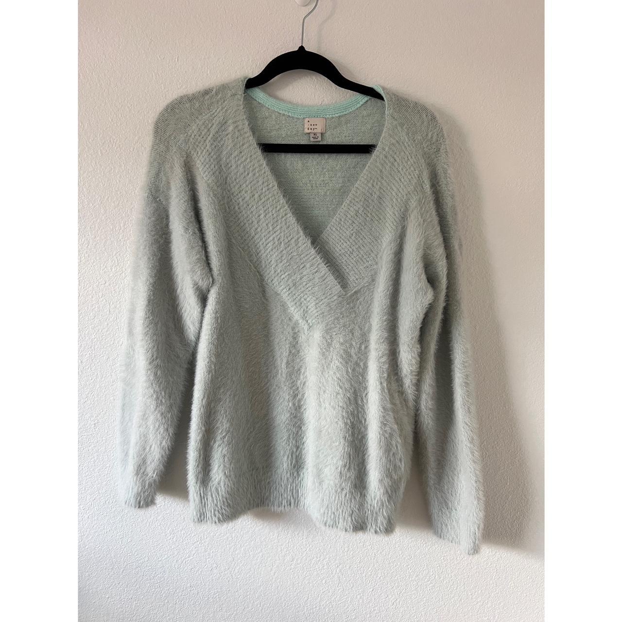 Light blue fuzzy sweater with a V neck. A new Day. Depop