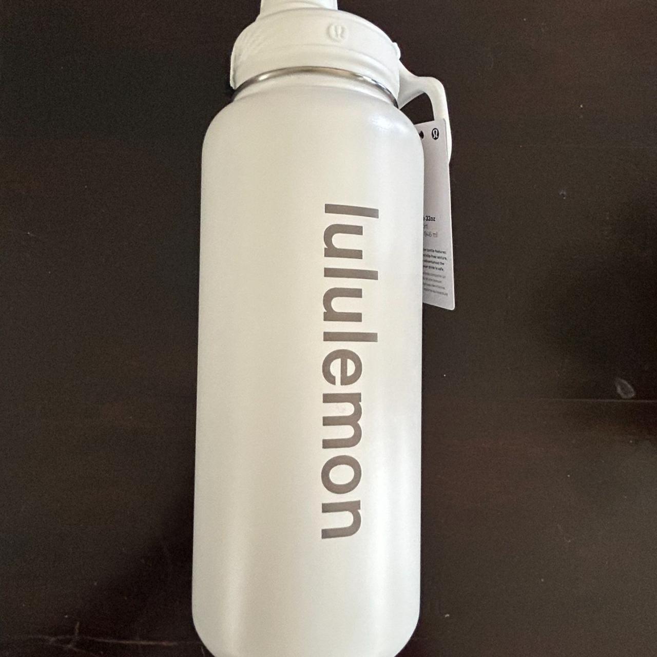 Lululemon water bottle. Pink with silver writing. - Depop