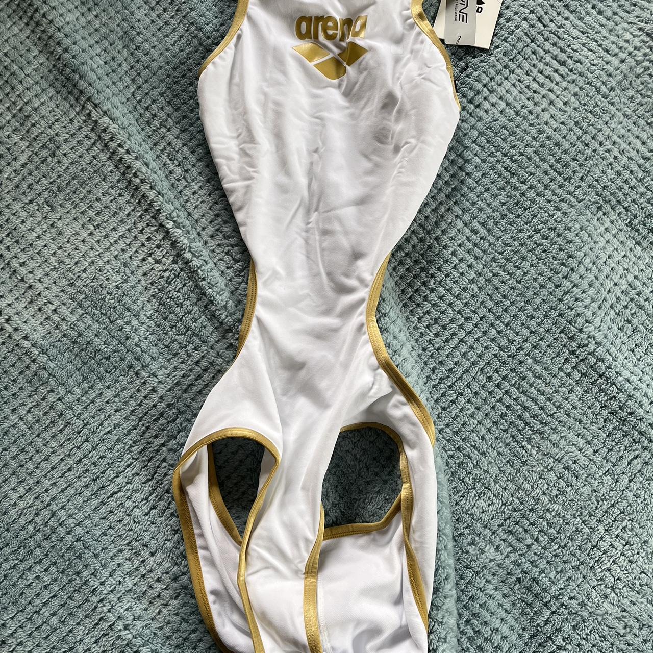 Arena open back racing suit, white and gold size... - Depop