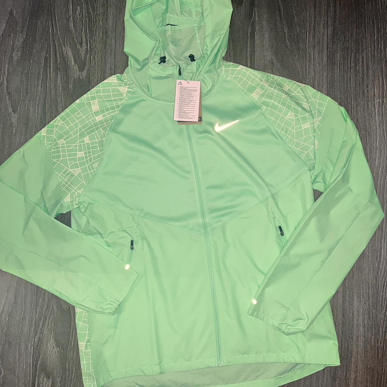 Nike mint green jacket running division Windrunner... Depop