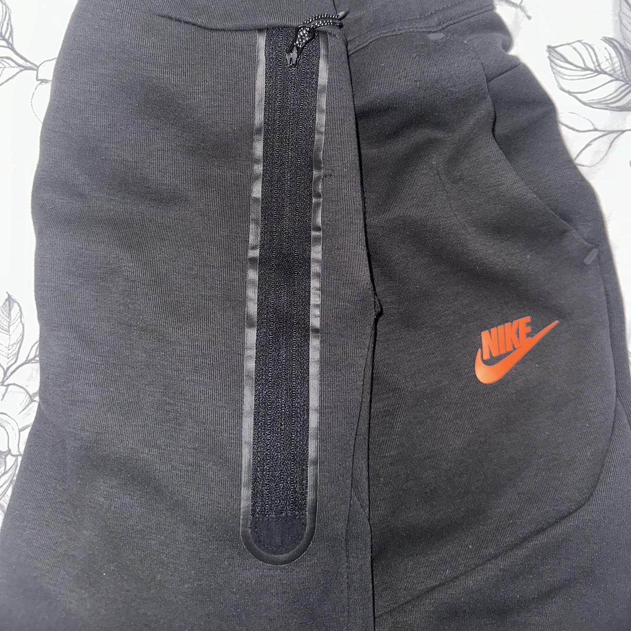 orange tech fleece tracksuit