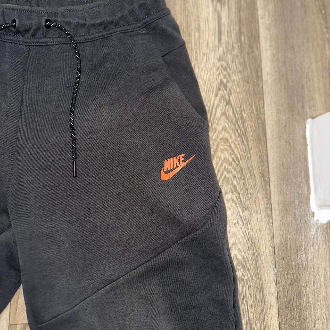 nike tech fleece grey orange