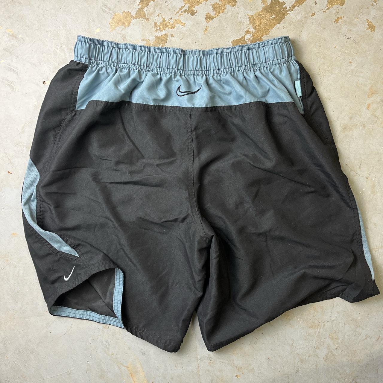 Nike embroidered mesh lined swim trunks Two front... - Depop