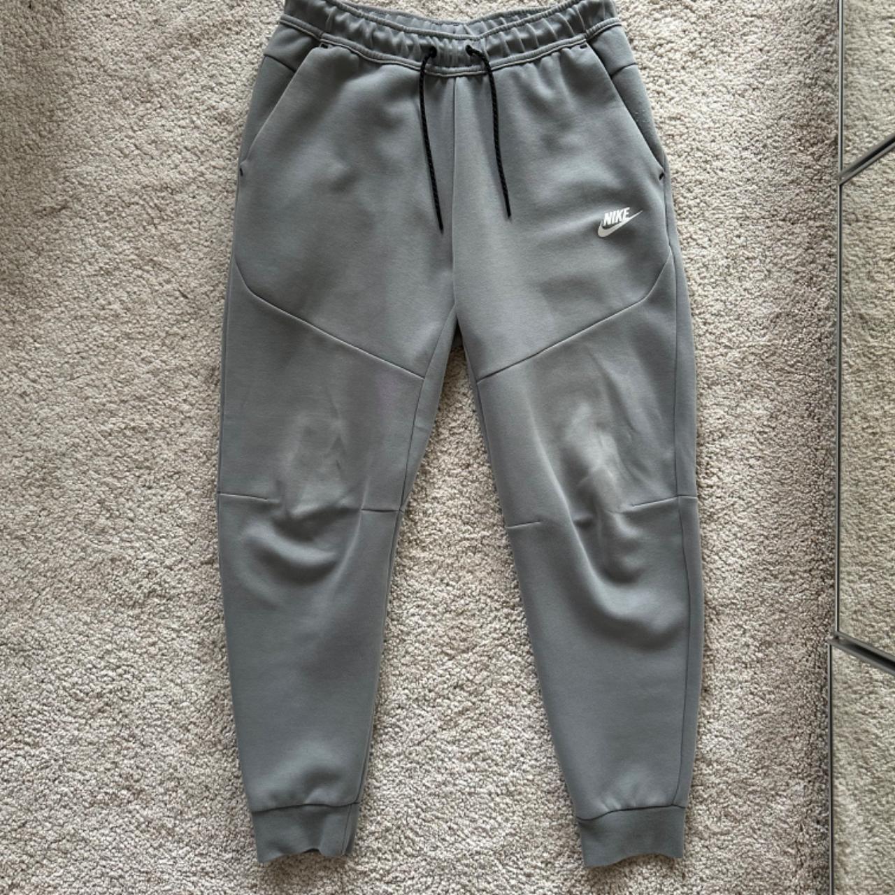 Nike tech fleece trousers size M Pretty worn -... - Depop