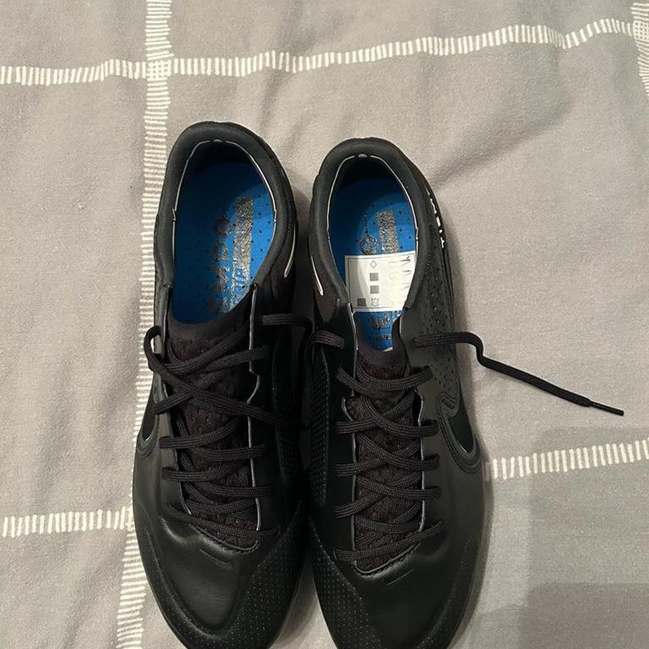 nike tempo all black