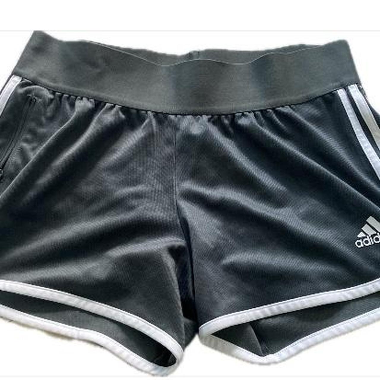 Black adidas shorts with green stripes best sale