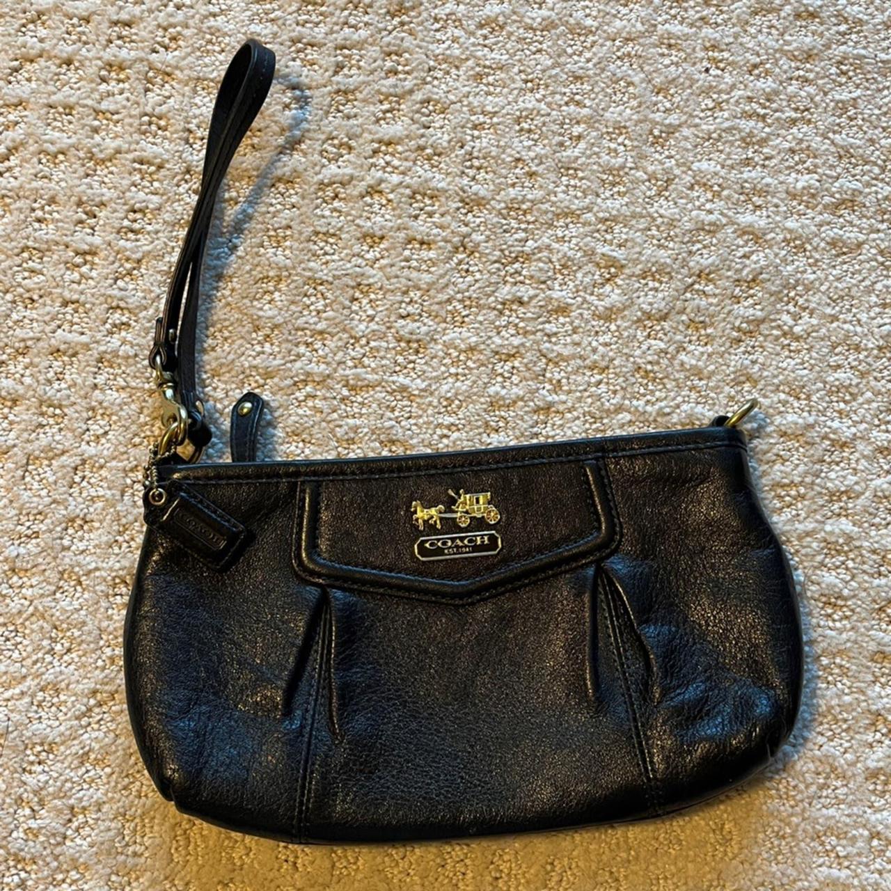 Coach Black Leather Wristlet with Red Lining In good. Depop