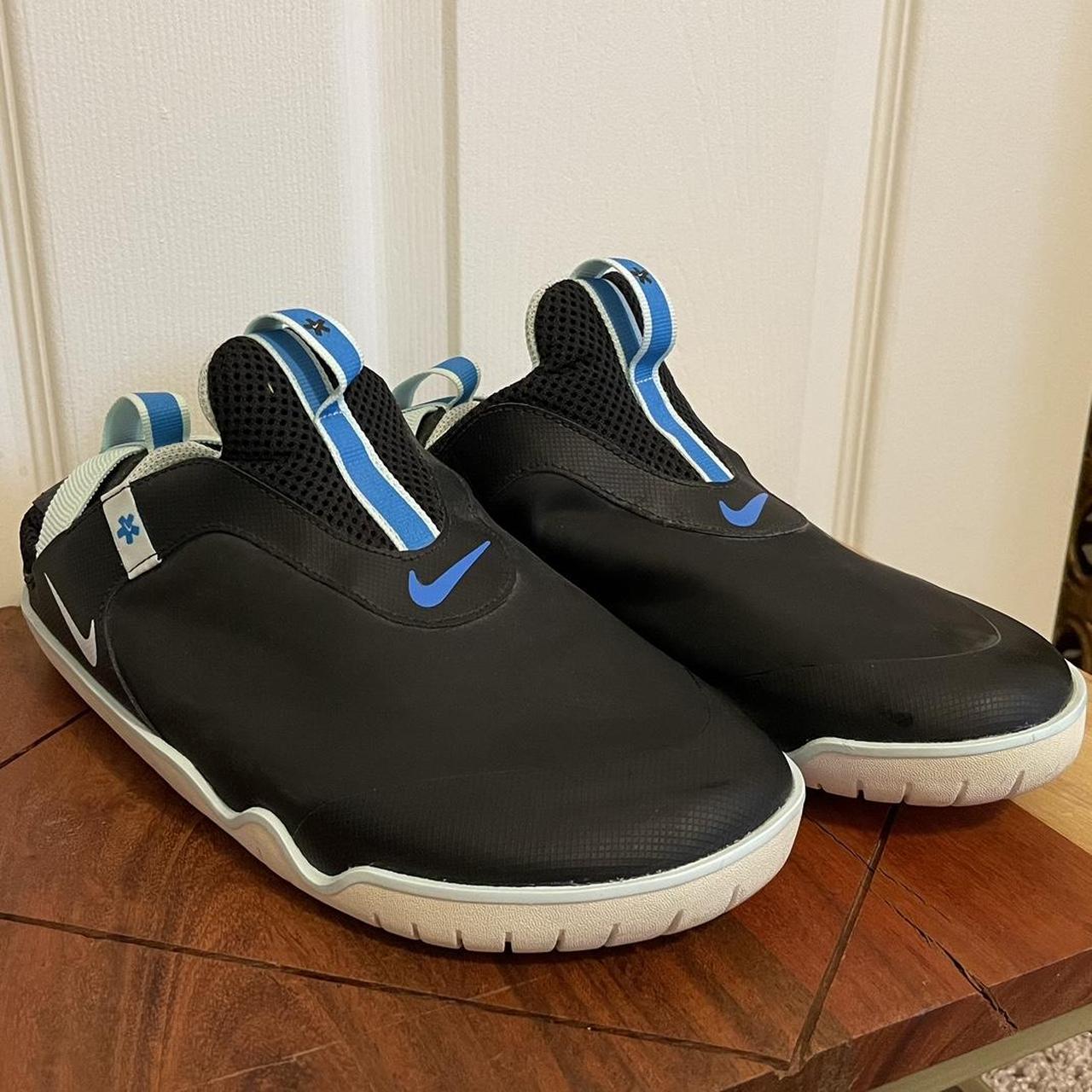 price of nike slippers