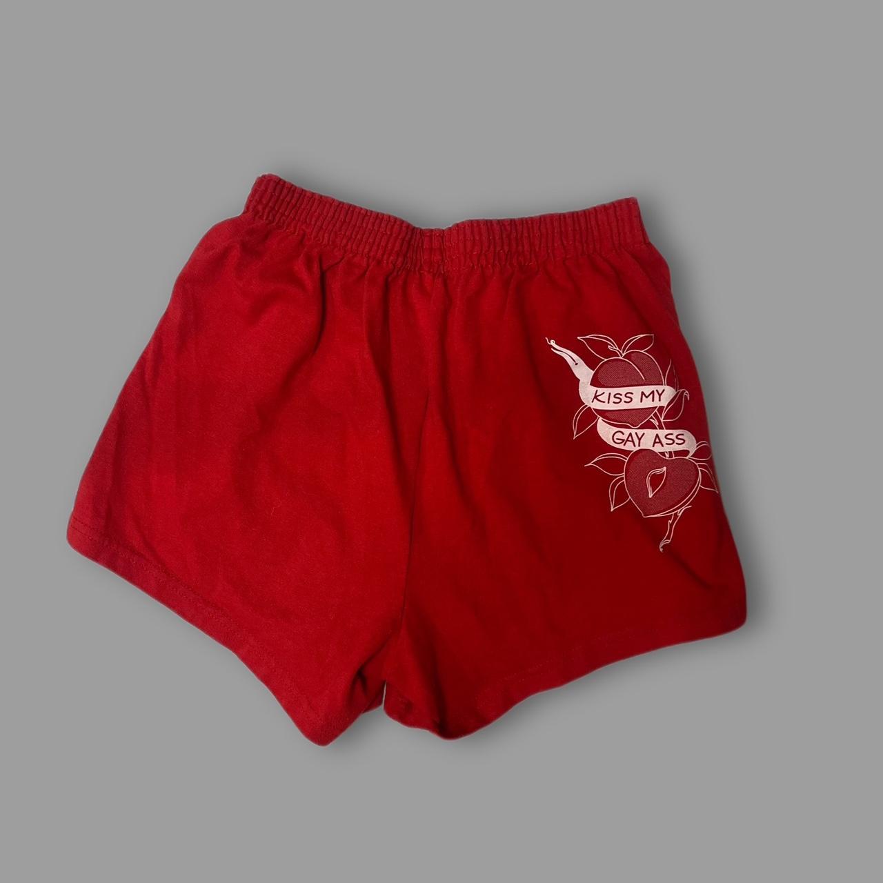 red comfy booty shorts with “kiss my gay ass” on the...