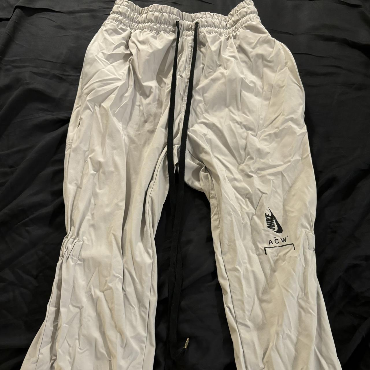 a cold wall x nike pants white