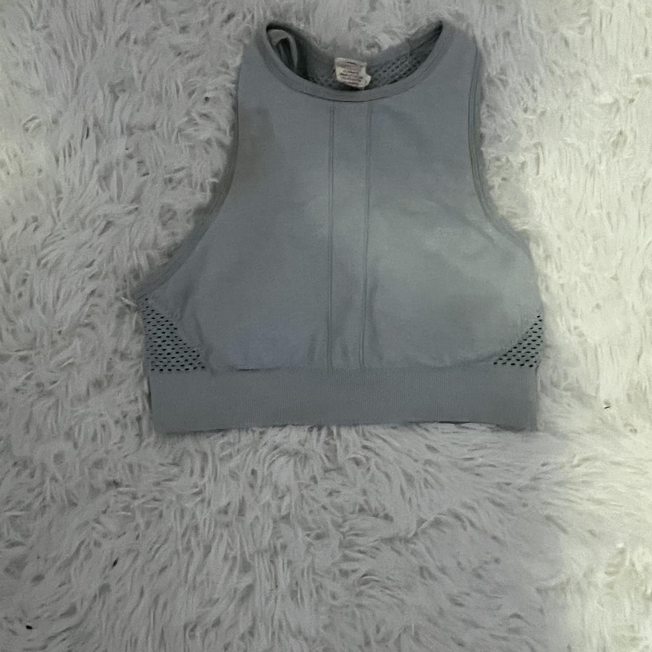 Very cute blue kohls sports bra Has a little stain... - Depop