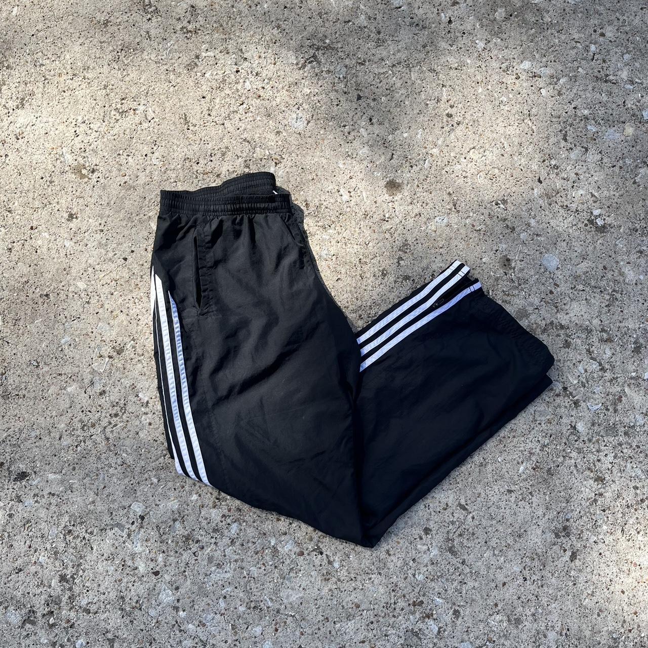 Adidas track pants stripes down the leg size M... - Depop